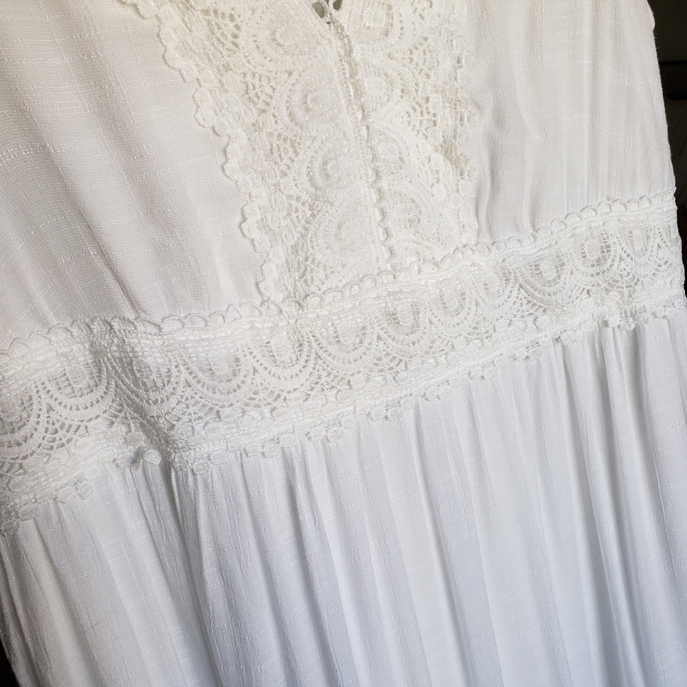 Sleeveless white dress